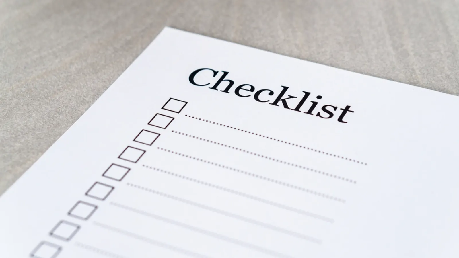 A printed sheet headed "Checklist", with empty tick boxes and dotted lines waiting to be filled in.